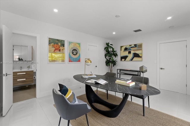3020 Alton Rd, Miami Beach, FL 33140 - home office featuring light tile patterned flooring, recessed lighting, and baseboards