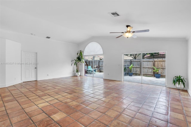 1903 SW 180th Ter, Miramar, FL 33029 - spare room featuring a ceiling fan, vaulted ceiling, baseboards, and crown molding