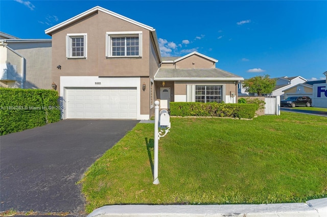 9465 SW 146th Ct, Miami, FL 33186 - view of front of home featuring a garage, driveway, stucco siding, and a front lawn