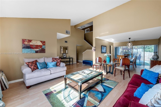 9465 SW 146th Ct, Miami, FL 33186 - living room featuring light wood finished floors and high vaulted ceiling