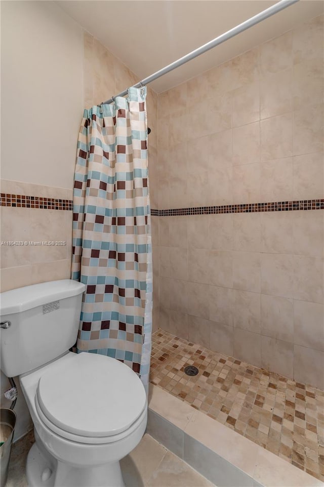 9465 SW 146th Ct, Miami, FL 33186 - bathroom with a stall shower and tile walls