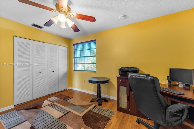9465 SW 146th Ct, Miami, FL 33186 - home office featuring ceiling fan, wood finished floors, and a textured ceiling