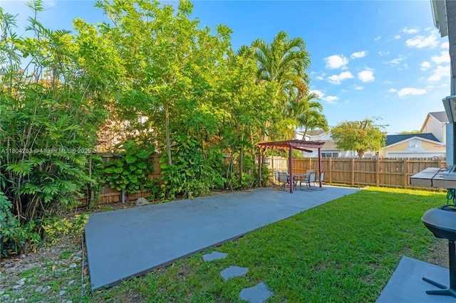 9465 SW 146th Ct, Miami, FL 33186 - fenced backyard featuring a pergola and a patio