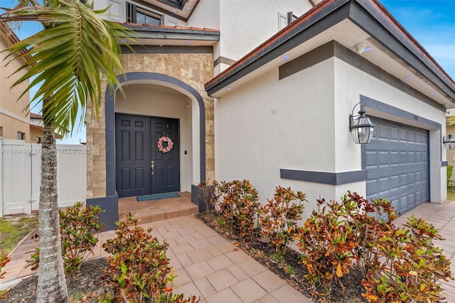 3531 W 104th Ter, Hialeah, FL 33018 - entrance to property featuring stucco siding, a garage, and driveway