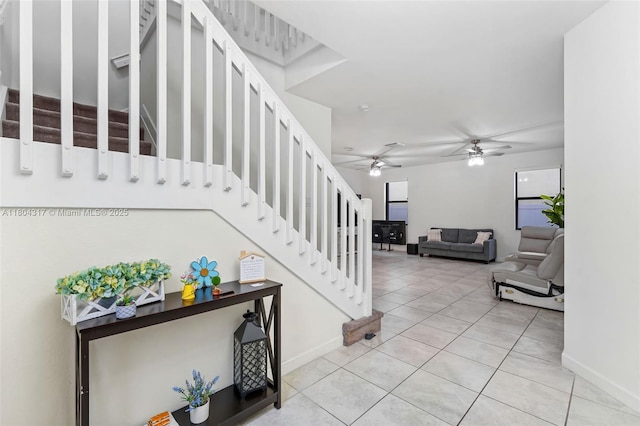 3531 W 104th Ter, Hialeah, FL 33018 - staircase featuring a ceiling fan, tile patterned flooring, and baseboards