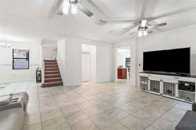 3531 W 104th Ter, Hialeah, FL 33018 - unfurnished living room featuring a ceiling fan, tile patterned floors, stairs, and baseboards