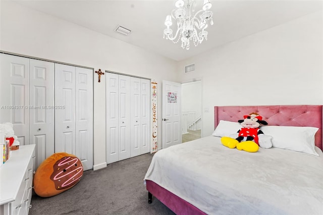 3531 W 104th Ter, Hialeah, FL 33018 - carpeted bedroom with multiple closets, a chandelier, and baseboards