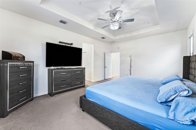 3531 W 104th Ter, Hialeah, FL 33018 - bedroom featuring a tray ceiling, light colored carpet, baseboards, and ceiling fan