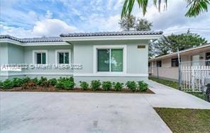 6035 SW 40th Ct, Miramar, FL 33023 - view of side of home with fence and stucco siding