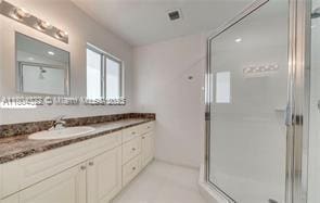 6035 SW 40th Ct, Miramar, FL 33023 - full bath with a stall shower and vanity