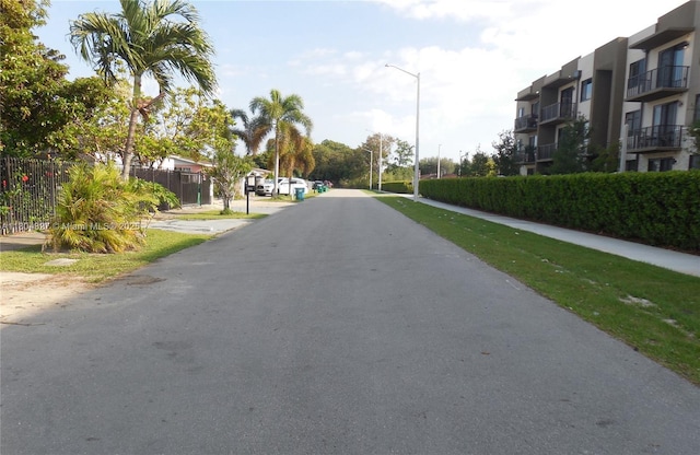 28520 SW 142nd Ave, Homestead, FL 33033 - view of asphalt road featuring street lights and sidewalks