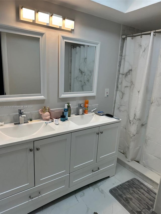 685 NE 206th Ter, Miami, FL 33179 - bathroom with marble finish floors, double vanity, and a shower with shower curtain