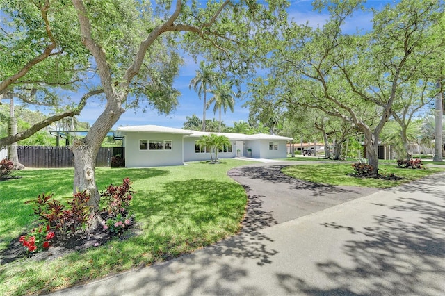 626 S 13th Ave, Hollywood, FL 33019 - single story home with stucco siding and asphalt driveway