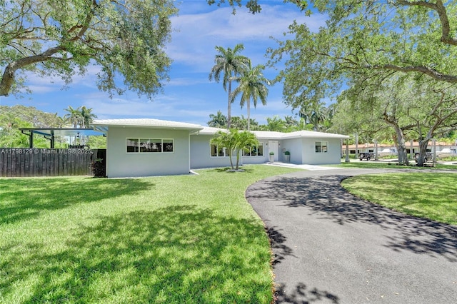626 S 13th Ave, Hollywood, FL 33019 - single story home with stucco siding and asphalt driveway