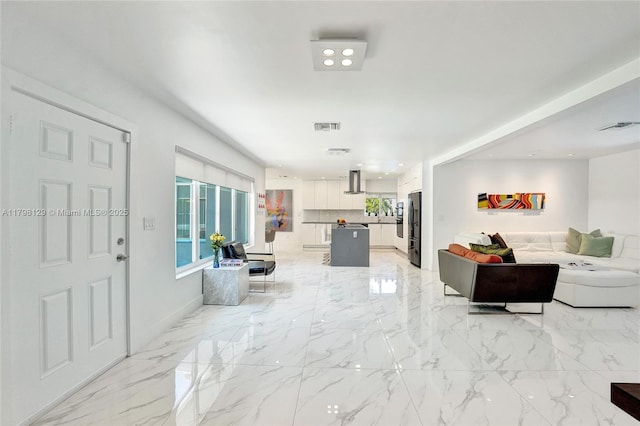 626 S 13th Ave, Hollywood, FL 33019 - living room featuring light marble finish flooring