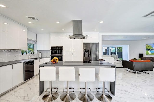 626 S 13th Ave, Hollywood, FL 33019 - kitchen with black appliances, island exhaust hood, modern cabinets, a sink, and dark countertops