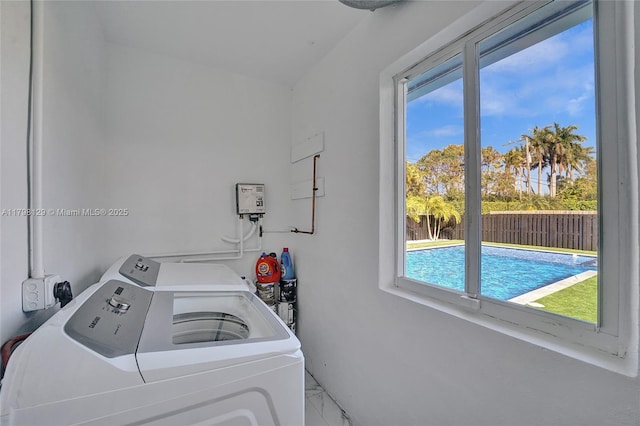 626 S 13th Ave, Hollywood, FL 33019 - laundry room with separate washer and dryer and marble look tile flooring