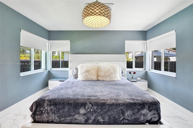 626 S 13th Ave, Hollywood, FL 33019 - bedroom with marble look tiles and baseboards