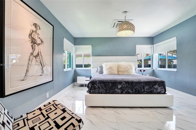 626 S 13th Ave, Hollywood, FL 33019 - bedroom with marble look tiles and baseboards