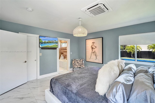626 S 13th Ave, Hollywood, FL 33019 - bedroom with light marble finish flooring, multiple windows, and ensuite bathroom