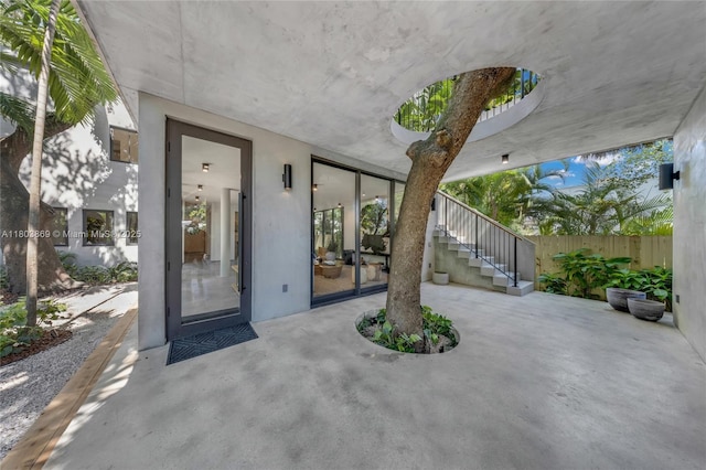 1000 NW 9th Ct, Miami, FL 33136 - view of patio featuring stairway and fence