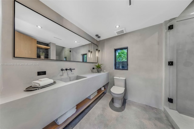 1000 NW 9th Ct, Miami, FL 33136 - bathroom featuring finished concrete floors, toilet, a shower stall, recessed lighting, and vanity