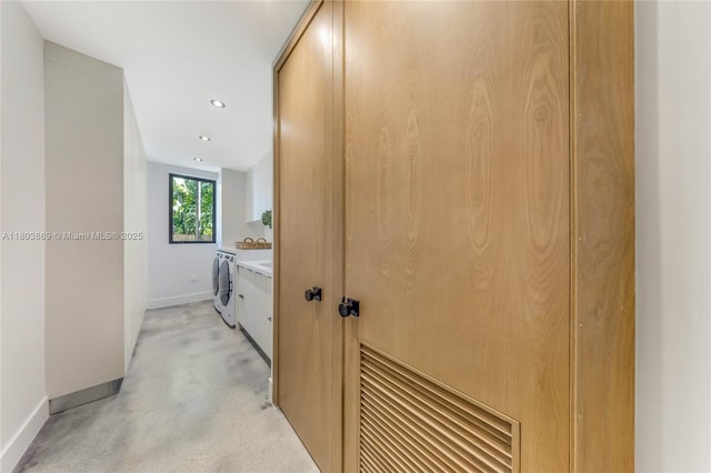 1000 NW 9th Ct, Miami, FL 33136 - laundry area with washing machine and dryer, baseboards, recessed lighting, and light colored carpet