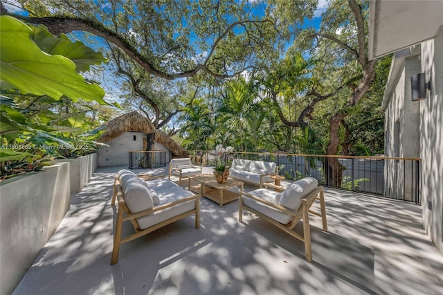 1000 NW 9th Ct, Miami, FL 33136 - view of patio / terrace with an outdoor living space with a fireplace and area for grilling