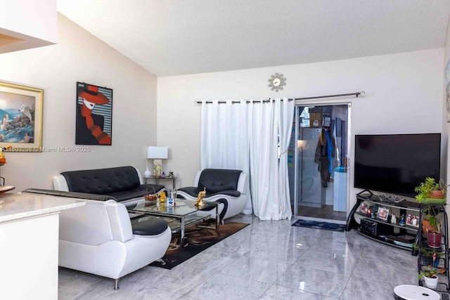 2541 Boundbrook Blvd Unit 122, Palm Springs, FL 33406 - living room featuring marble tiled floors and a textured ceiling