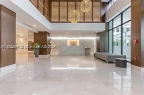 540 Brickell Key Dr Unit 302, Miami, FL 33131 - community lobby featuring a towering ceiling