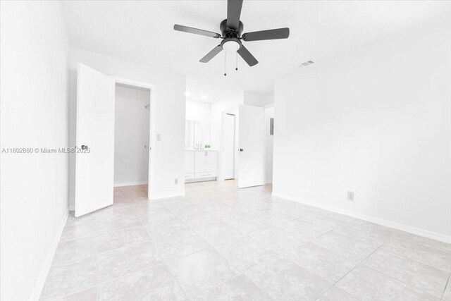 3420 N Pinewalk Dr N Unit 713, Margate, FL 33063 - unfurnished room featuring ceiling fan, light tile patterned floors, and baseboards