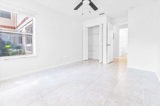 3420 N Pinewalk Dr N Unit 713, Margate, FL 33063 - tiled empty room featuring ceiling fan and baseboards