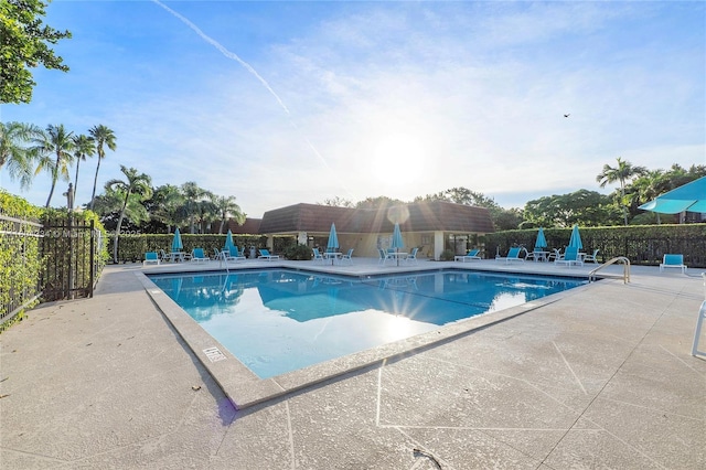 718 NW 98th Cir Unit 718, Plantation, FL 33324 - community pool with a patio area and fence