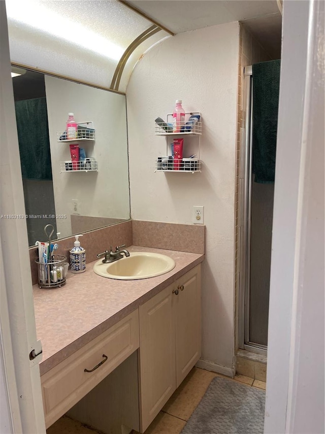 2911 N Pine Island Rd Unit 311, Sunrise, FL 33322 - full bathroom featuring vanity, a shower stall, and tile patterned flooring
