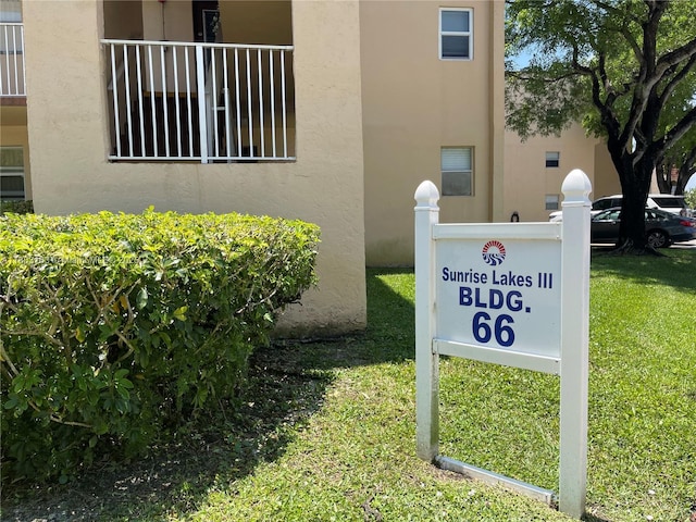 2911 N Pine Island Rd Unit 311, Sunrise, FL 33322 - community / neighborhood sign featuring a yard