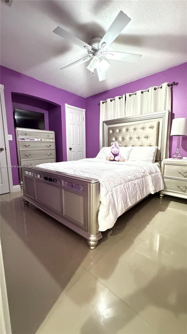 14620 SW 151st Ter, Miami, FL 33186 - bedroom featuring a ceiling fan and a textured ceiling
