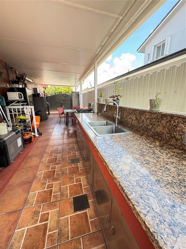 14620 SW 151st Ter, Miami, FL 33186 - fenced backyard with a sink and a patio