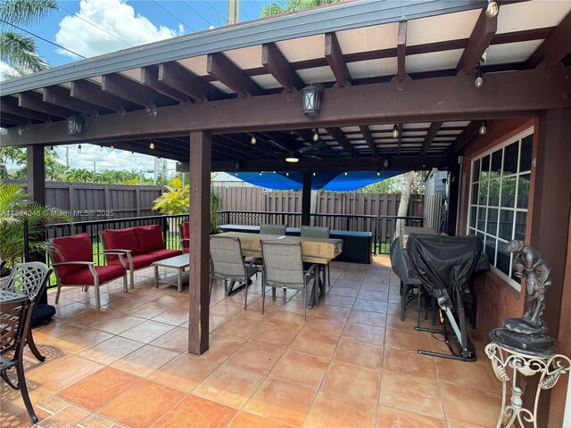 14620 SW 151st Ter, Miami, FL 33186 - view of patio featuring outdoor dining space, an outdoor hangout area, and grilling area