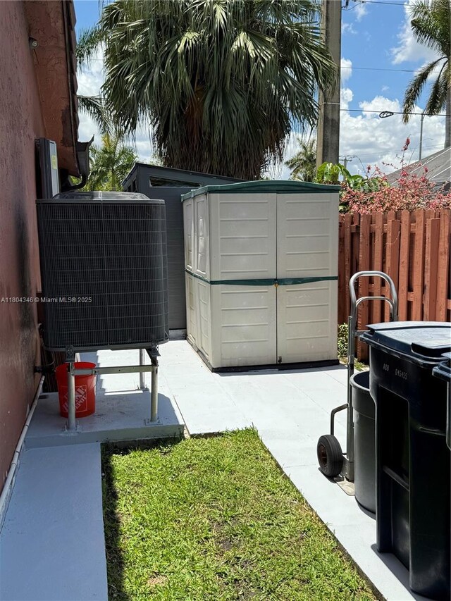 14620 SW 151st Ter, Miami, FL 33186 - view of yard with cooling unit and a patio