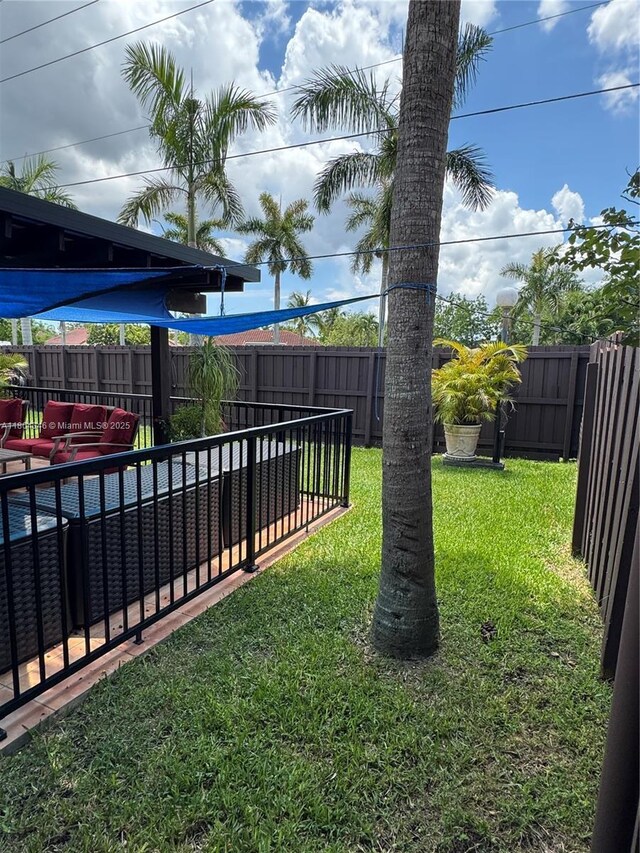 14620 SW 151st Ter, Miami, FL 33186 - view of yard with an outdoor living space