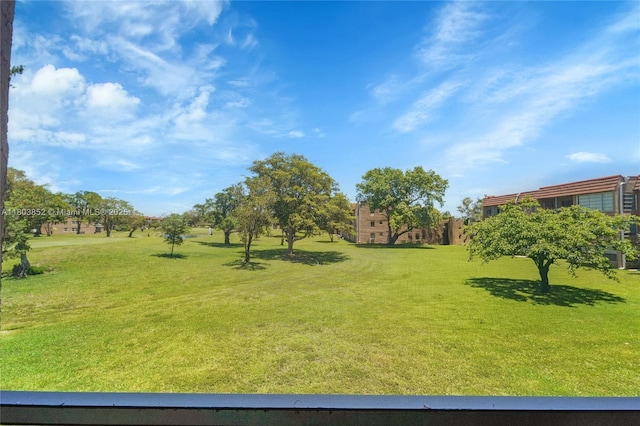 9781 Sunrise Lakes Blvd Unit 202, Sunrise, FL 33322 - view of green lawn
