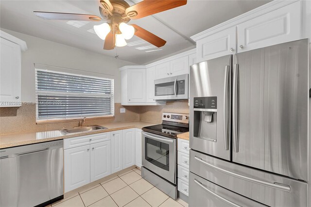 9781 Sunrise Lakes Blvd Unit 202, Sunrise, FL 33322 - kitchen featuring appliances with stainless steel finishes, a ceiling fan, light countertops, and decorative backsplash