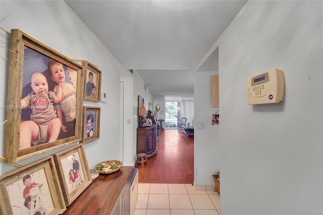 9781 Sunrise Lakes Blvd Unit 202, Sunrise, FL 33322 - corridor featuring light tile patterned floors and baseboards