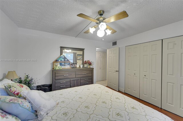 9781 Sunrise Lakes Blvd Unit 202, Sunrise, FL 33322 - bedroom featuring wood finished floors, a textured ceiling, a closet, and a ceiling fan