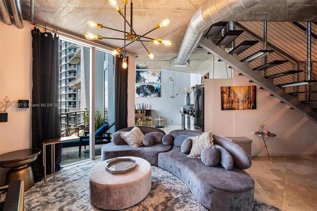 690 SW 1st Ct Unit Phi26, Miami, FL 33130 - living area featuring a wall of windows and a chandelier