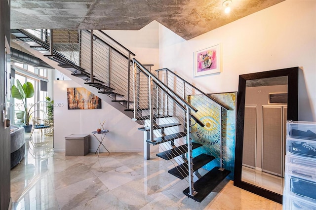690 SW 1st Ct Unit Phi26, Miami, FL 33130 - stairs featuring marble tiled floors and baseboards