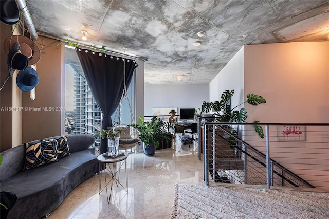 690 SW 1st Ct Unit Phi26, Miami, FL 33130 - living room featuring marble tiled floors and an office area