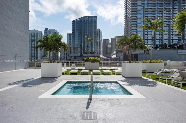 690 SW 1st Ct Unit Phi26, Miami, FL 33130 - view of pool with a skyline view, a swimming pool, and a patio area