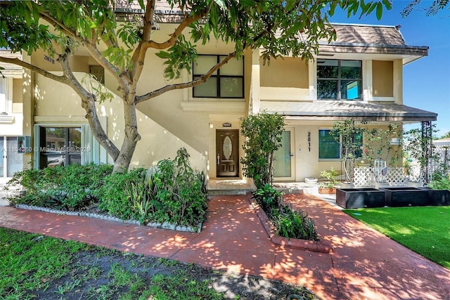 2807 NE 164th St Unit 2, North Miami Beach, FL 33160 - view of front of house with stucco siding