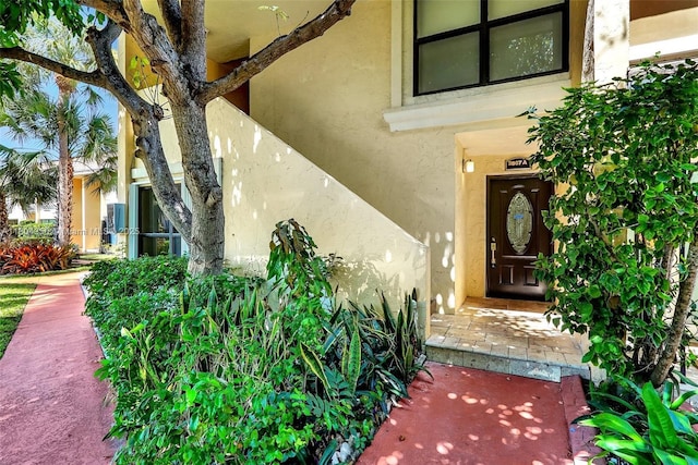 2807 NE 164th St Unit 2, North Miami Beach, FL 33160 - view of exterior entry with stucco siding